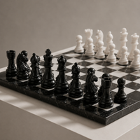 Close-up of black marble chess pieces — Stone & Game