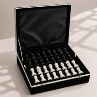 Black and white marble chess set with velvet storage case — Stone & Game