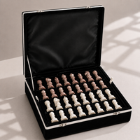 Pink and white marble chess set with velvet storage case — Stone & Game