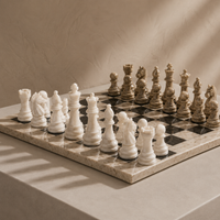 Close-up of black marble chess pieces on coral board — Stone & Game