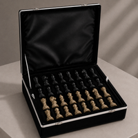 Coral and black marble chess set with velvet storage case — Stone & Game