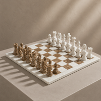 Brown and white marble chess set on display — Stone & Game