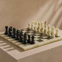 Green onyx and black marble chess set side angle — Stone & Game