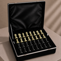 Green onyx and black marble chess pieces in velvet storage case — Stone & Game