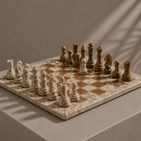 Brown marble king and queen chess pieces detail — Stone & Game