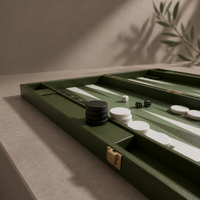 Gold hardware detail on green leather backgammon case — Stone & Game