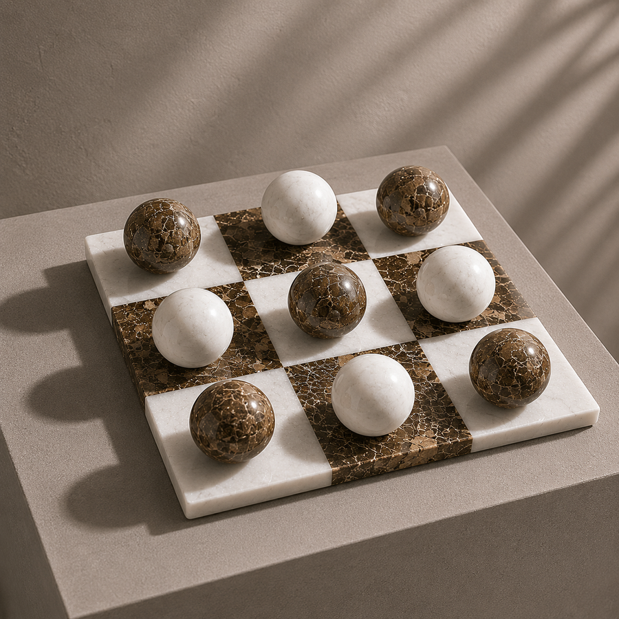 Brown and white Italian marble spheres close-up — Stone & Game
