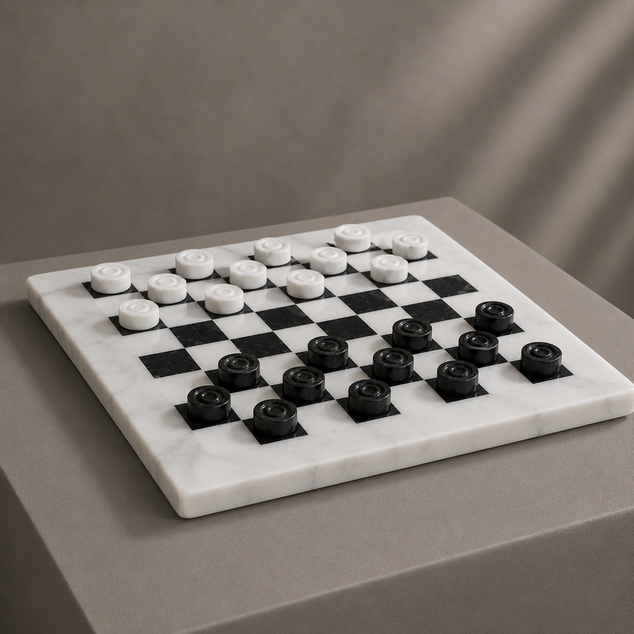 White marble checkers set with black pieces on pedestal — Stone & Game