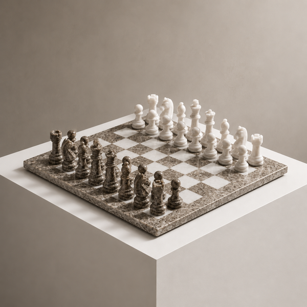 Grey and white marble chess set on display pedestal — Stone & Game