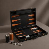 Black leather backgammon set open with pieces and dice — Stone & Game