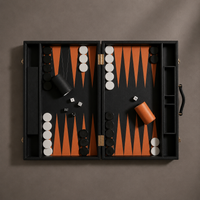 Black leather backgammon board top view with orange accents — Stone & Game