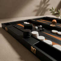Black leather backgammon detail with black and white pieces — Stone & Game