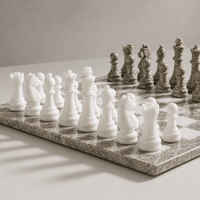 White marble chess pieces detail — Stone & Game
