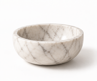 Carrara marble bowl close-up showing grey veining