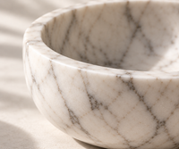 Carrara marble decorative bowl in modern interior