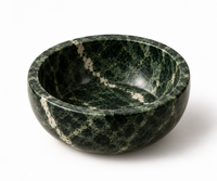 Green marble bowl close-up showing natural veining