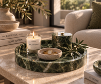 Round green marble tray on coffee table