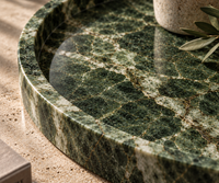 Round green marble tray in living room interior