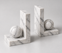 Carrara marble bookend close-up showing grey veining