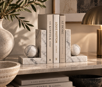 Carrara marble bookends styled on desk