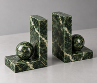 Green marble bookend close-up showing natural veining
