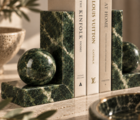 Green marble bookends in modern living room