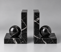 Pair of black marble bookends with sculptural sphere detail – Stone & Gem