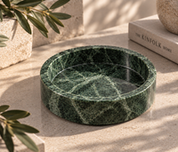 Green marble catchall tray close-up showing natural veining