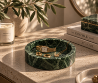 Green marble catchall tray on bedside table