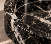 Black marble catchall tray in bathroom interior