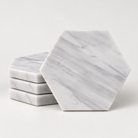 Set of four Carrara marble hexagon coasters, white with grey veining – Stone & Gem