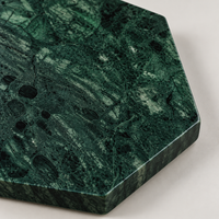 Green marble coaster set in modern Scandinavian interior