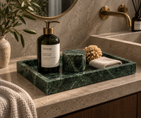 Green marble vanity tray on bathroom counter
